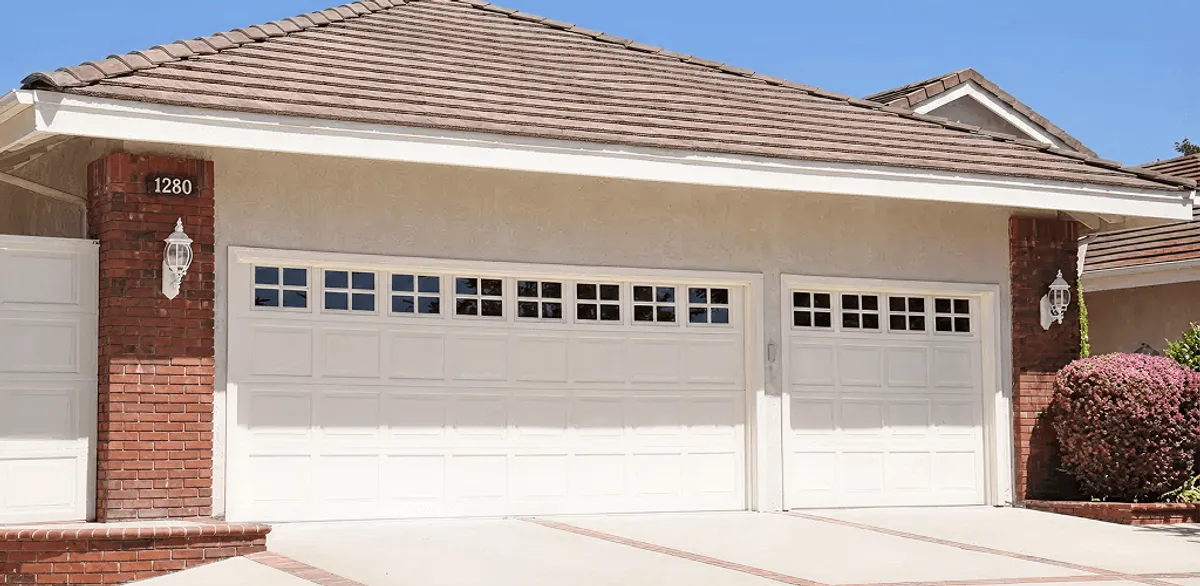 Residential garage door repair service for a double garage door in Memphis, TN